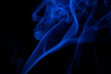 Colorful smoke close-up on a black background