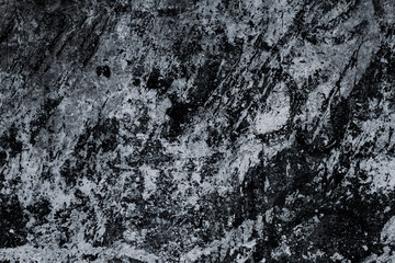 Black and white marble surface, texture. Abstract background, pattern. Dark tile close-up, great design. Old dirty stone wall. Grunge gray granite slab.