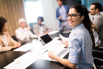 Creative business people working on business project