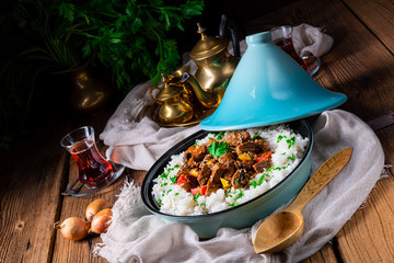 Tajin beef stew with rice paprika and sesame seeds