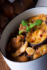 Veal goulash with baked aubergine and herbs