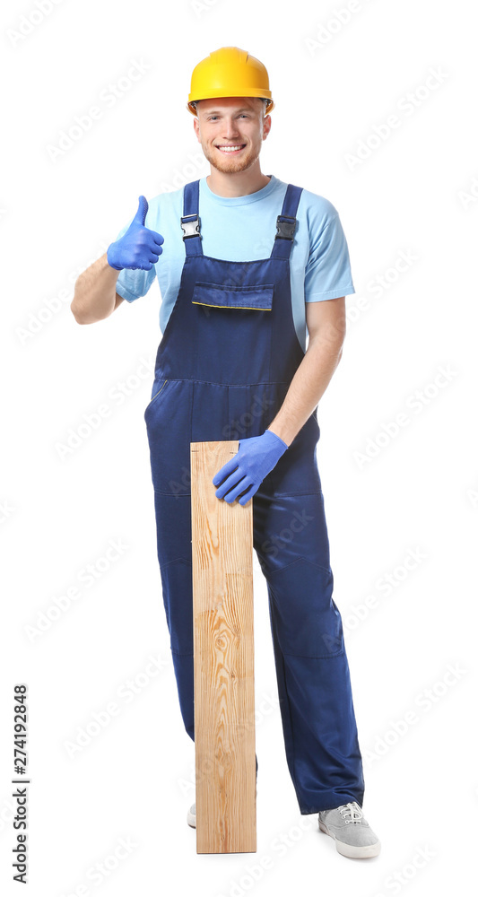 Wall mural Male carpenter showing thumb-up gesture on white background