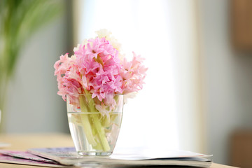 Bouquet of beautiful flowers in vase on table