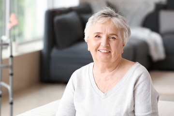 Fototapeta na wymiar Portrait of elderly woman in nursing home