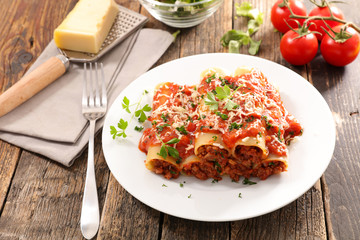 cannelloni with beef, tomato sauce and cheese