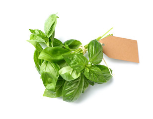 Fresh green basil with tag on white background