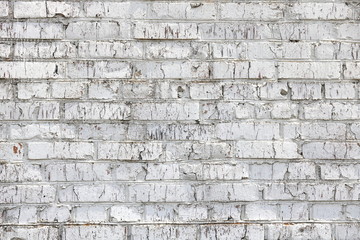 Old wall made of red brick, painted white in loft style for modern designer interior of room, bar or restaurant
