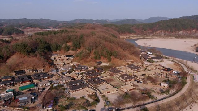 High altitude fly away from traditional Korean village