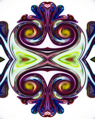 Colorful liquid paints mixed together creating modern pattern.