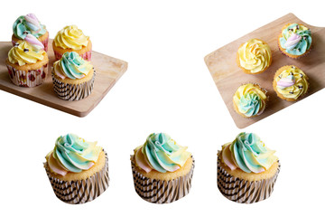 Cup cake on wooden chopping board isolated on white background.