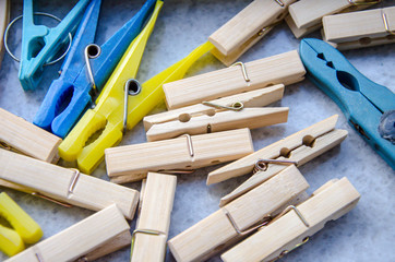 Multicolored Laundry clips on the grey backround