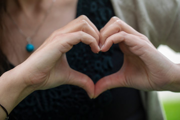 Young Women, Hands , Finger and Heart Symbol