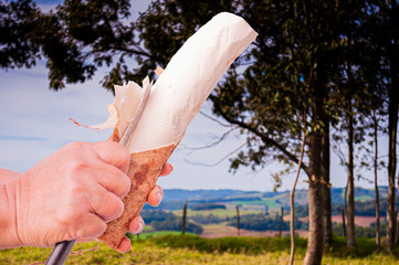 peeling cassava with the knife