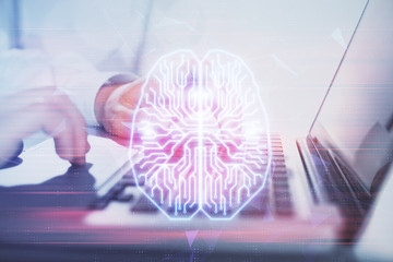 Man typing on keyboard background with brain hologram. Concept of big Data.