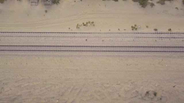 Train tracks in the desert aerial footage (4K)