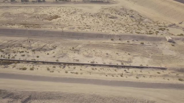 Long oil pipeline in the desert aerial footage (4K)