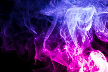 Colored smoke on black background