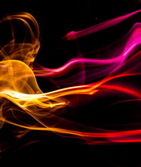 Obraz premium Colored smoke on black background