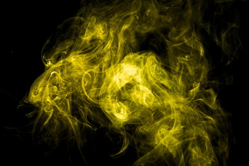 Yellow smoke on black background