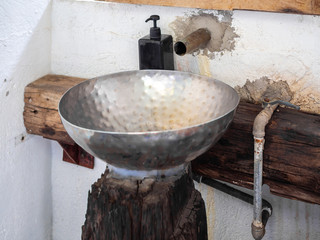 Old vintage stainless steel basin decoration