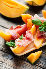 Italian antipasto with melon and ham