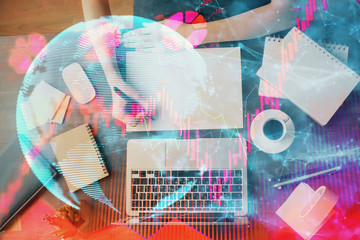 International business hud over woman's hands writing background. Concept of hard work. Double exposure