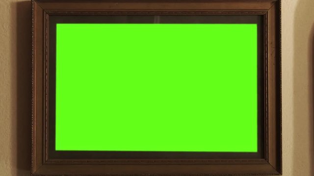 Old Wooden Frame with Green Screen. You can replace green screen with the footage or picture you want with “Keying” effect in  (check out tutorials on Internet). Zoom In. 