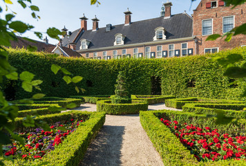 Hidden renaissance style garden 'Prinsentuin' in the inner city of Groningen, the Netherlands. - obrazy, fototapety, plakaty