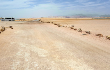 Fototapeta na wymiar Desert Landscape road and stone.