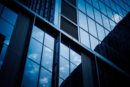 Urban abstract - windowed corner of office building.