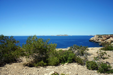 Landscapes of Ibiza.Uninhabited coast overlooking the island of Sa Conillera.Spain.