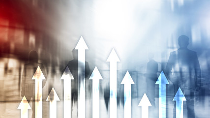 Up arrow graph on skyscraper background. Invesment and financial growth concept.
