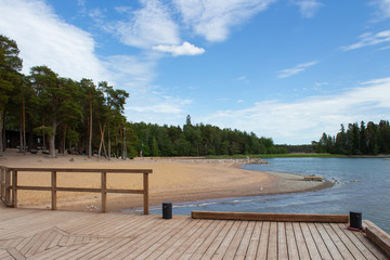 City public beach and resting place in Ruissalo Park in the island part of Turku in Finland on a summer day. Recreation and nature in Finland.