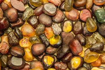 colorful round shape stones closeup background top view