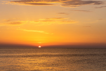 Naklejka na ściany i meble sunset at the sea