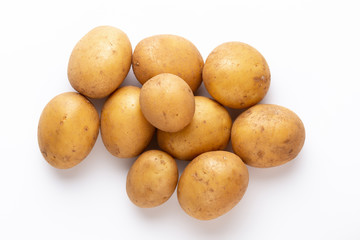 Potatoes isolated on white background. Flat lay. Top view.