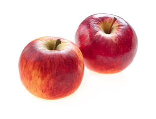 Fototapeta na wymiar two red apples on white background. Close-up isolated view