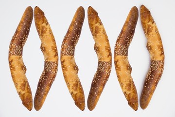 Traditional Balkan baguettes on white background