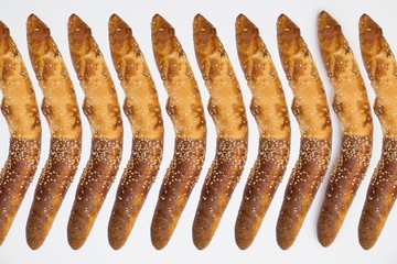 Traditional Balkan home-baked baguettes isolated on white background