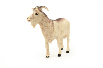 Toy goat isolated on white background