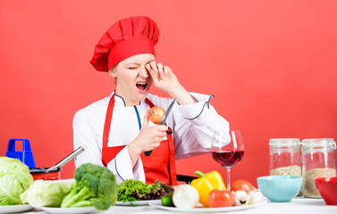 restaurant menu. Dieting. organic eating and vegetarian. Housewife. woman cooking healthy food by recipe. professional chef on red background. woman in cook hat crying because of onion