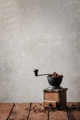 Retro wooden coffee grinder with copyspace