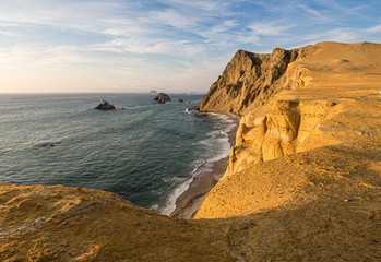 Coast of Paracas in Peru during the sunset