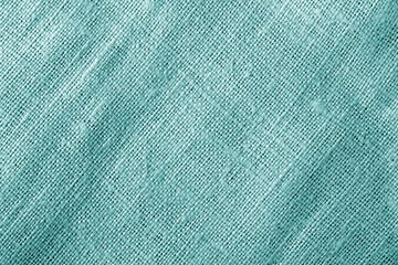 Sack cloth texture in cyan color.