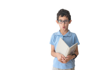 Boy in spectacles and t-shirt looking to his book. Isolated over white background. Schoolboy. Teenager.