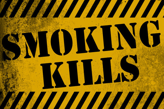 Smoking kills sign yellow with stripes