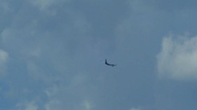 The plane goes down. Passenger boeing flies in the sky. Emergency landing.