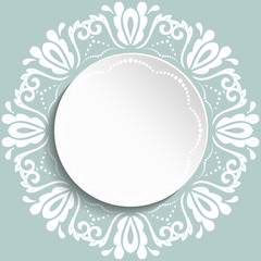 Round vector frame with floral white elements and arabesques. Pattern with arabesques. Fine greeting card