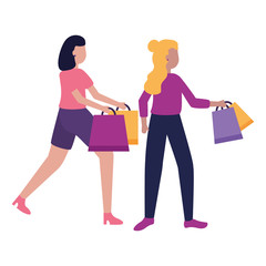 two women holding shopping bags