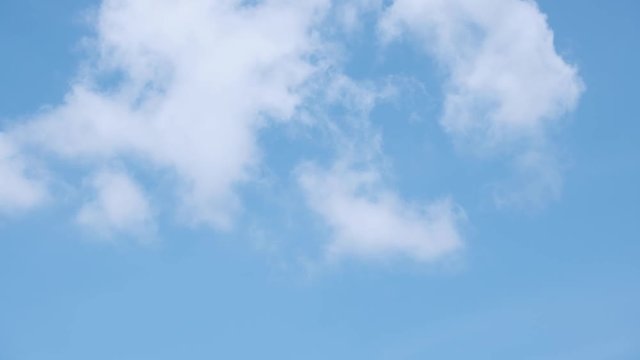 Time lapse single nature white cloud on blue sky background in daytime